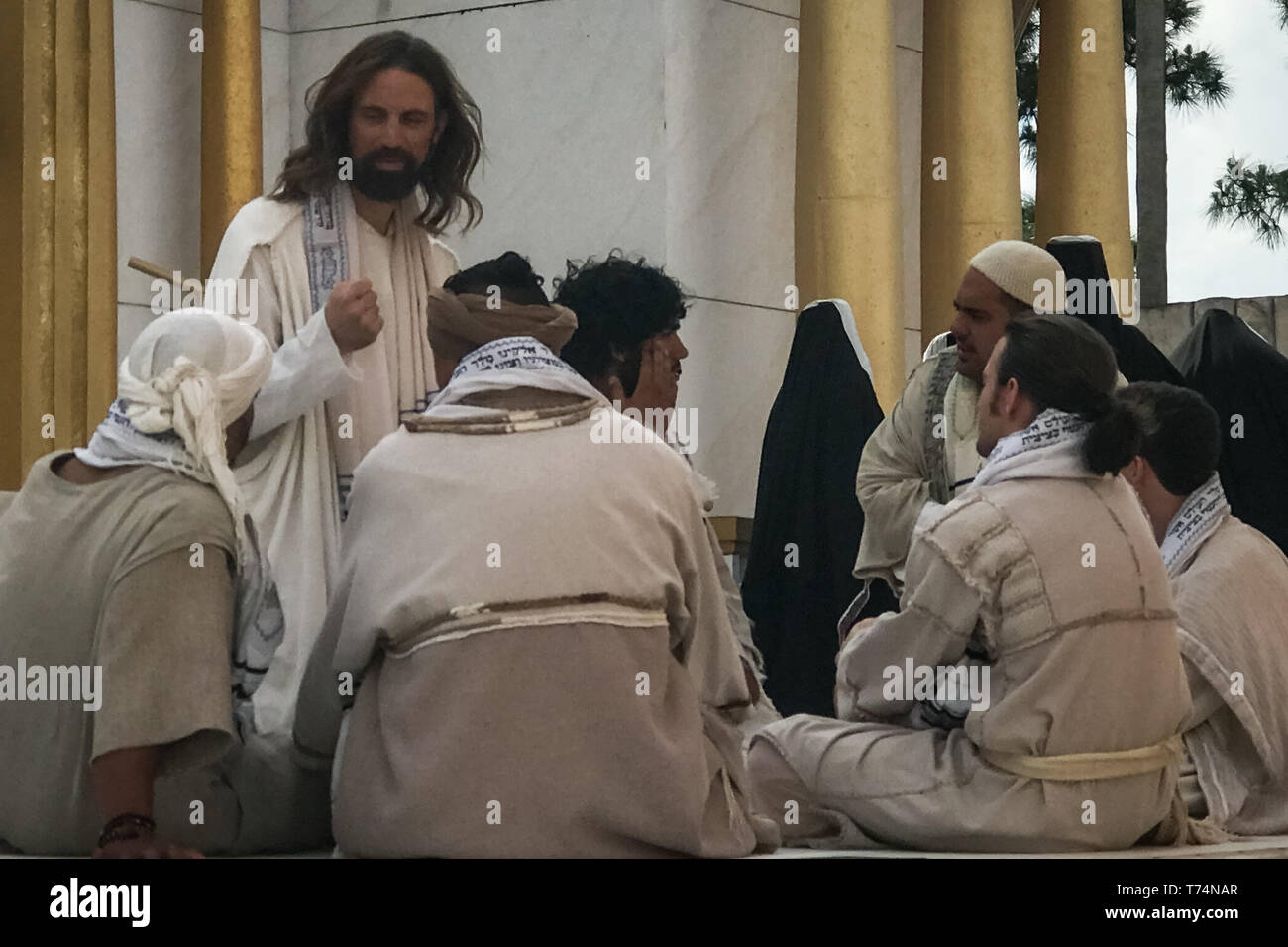 Orlando, Florida, USA. 3rd May, 2019. An actor portraying Jesus in the Holy Land Experience (HLE) performance of ''Jesus At The Temple'' speaks to his followers in Orlando, Florida. The HLE theme park, owned by the Trinity Broadcasting Network, recreates the architecture and themes of the ancient city of Jerusalem in 1st-century Judea. HLE is a non-denominational Christian living biblical museum and church. Performers give multiple religious-themed shows in various venues throughout the park each day. Credit: Tracy Barbutes/ZUMA Wire/Alamy Live News Stock Photo