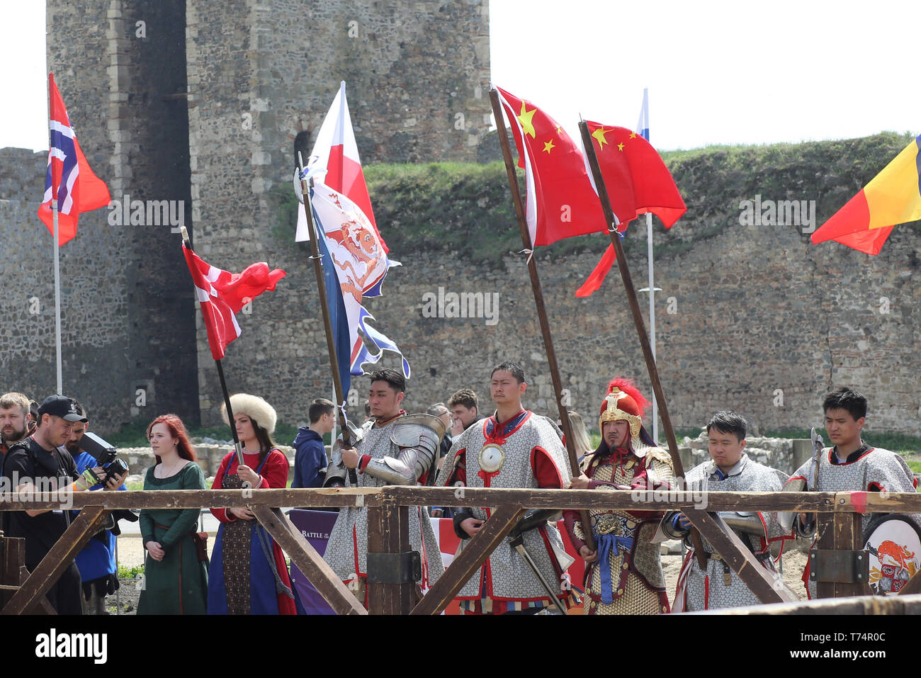 Smederevo. 2nd May, 2019. Chinese team members stand at the opening of the 10th World National HMB (Historic Medieval Battle) Championship in Smederevo, Serbia on May 2, 2019. Fighters from 40 countries gathered in the Serbian city of Smederevo for an unusual international tournament that recreates historic battle techniques-the World National HMB Championship. The Chinese team is made up of 27 members, and it is China's third appearance at the event. Credit: Nemanja Cabric/Xinhua/Alamy Live News Stock Photo