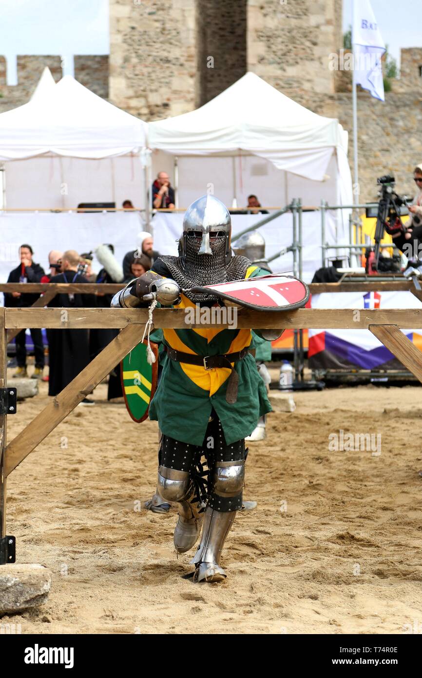 Smederevo. 2nd May, 2019. A competitor dressed in kight outfit rests before a fight at the opening day of the 10th World National HMB (Historic Medieval Battle) Championship in Smederevo, Serbia on May 2, 2019. Fighters from 40 countries gathered in the Serbian city of Smederevo for an unusual international tournament that recreates historic battle techniques-the World National HMB Championship. The Chinese team is made up of 27 members, and it is China's third appearance at the event. Credit: Shi Zhongyu/Xinhua/Alamy Live News Stock Photo