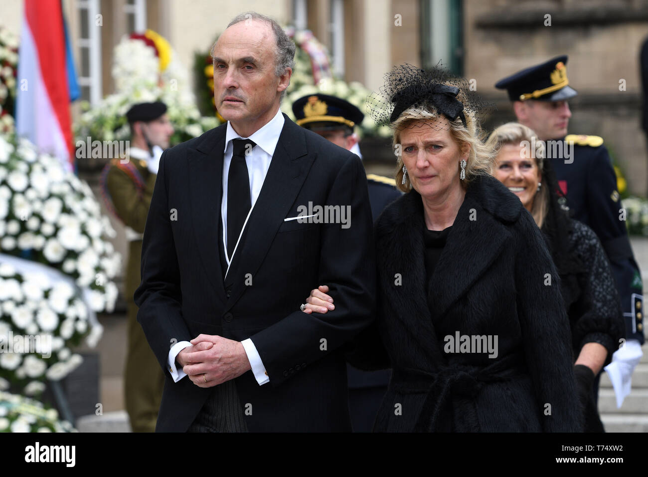 Luxemburg, Luxembourg. 04th May, 2019. Princess Astrid of Belgium and  Lorenz Habsburg-Lothringen leave the church after the state funeral of  Luxembourg's Old Grand Duke Jean. The former head of state of the