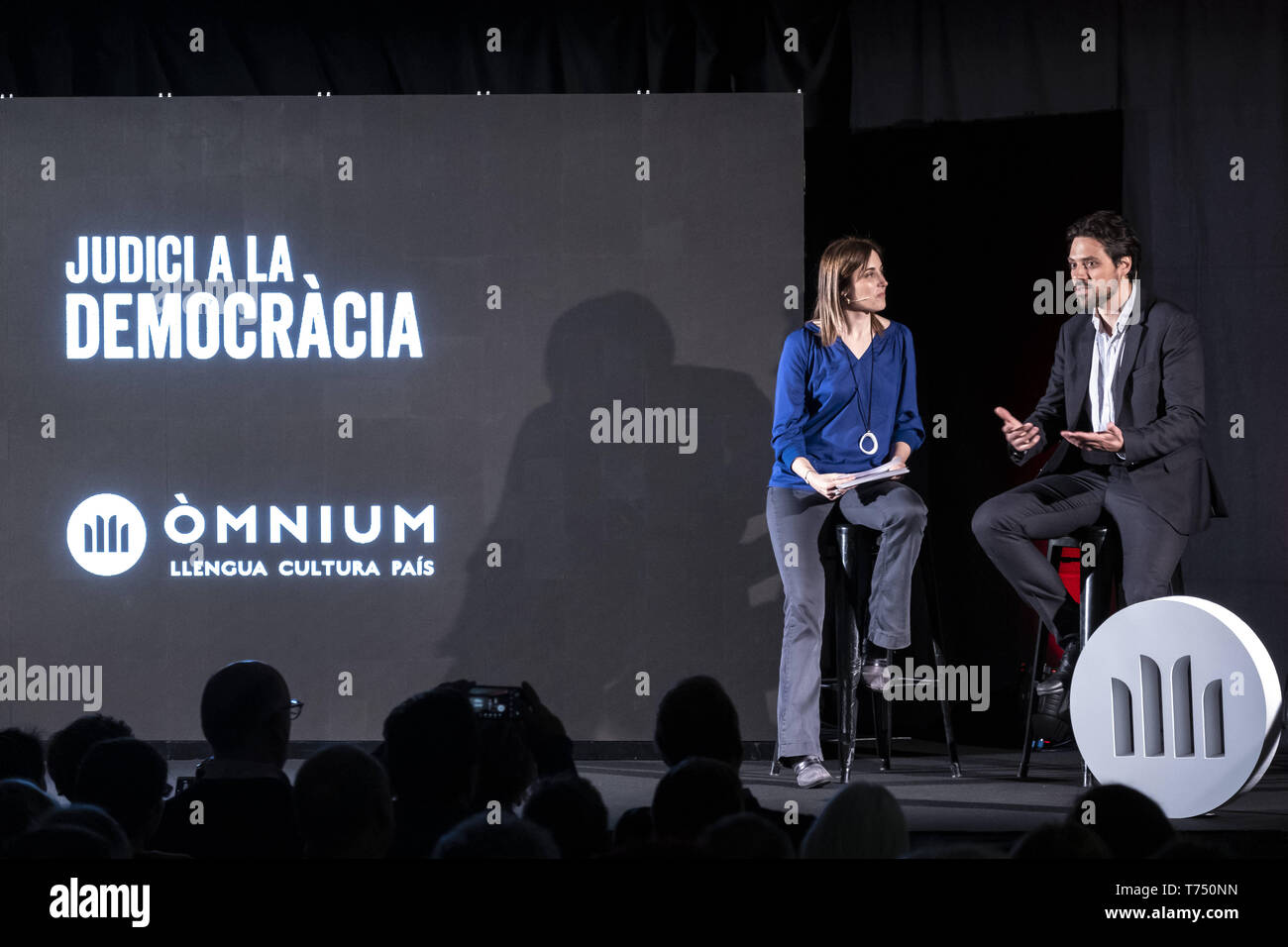 Barcelona, Catalonia, Spain. 4th May, 2019. The journalist and board member of 'mnium, Claudia Pujol seen accompanying Jordi Cuixart's defence lawyer Olivier Peter on stage during the presentation of The evidence forbidden by the Supreme Court. Credit: ZUMA Press, Inc./Alamy Live News Stock Photo