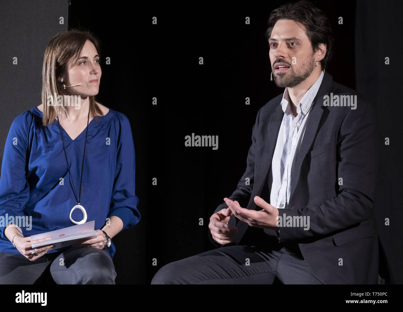 Barcelona, Catalonia, Spain. 4th May, 2019. The journalist and board member of 'mnium, Claudia Pujol seen accompanying Jordi Cuixart's defence lawyer Olivier Peter on stage during the presentation of The evidence forbidden by the Supreme Court. Credit: ZUMA Press, Inc./Alamy Live News Stock Photo