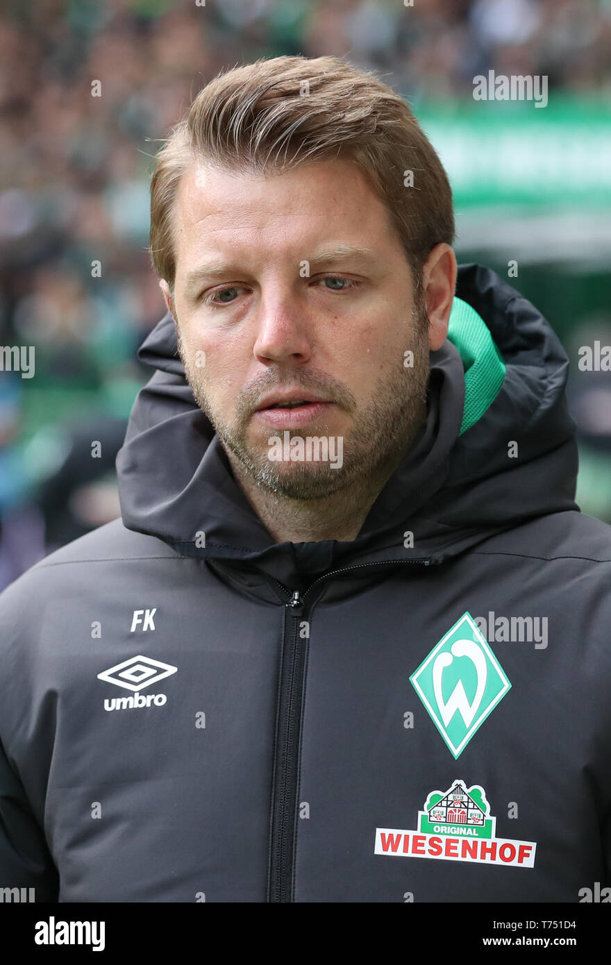 Bremen, Germany. 04th May, 2019. Soccer: Bundesliga, Werder Bremen - Borussia Dortmund, 32nd matchday in Weser Stadium. Bremen coach Florian Kohfeldt looks to the side. Credit: Friso Gentsch/dpa - IMPORTANT NOTE: In accordance with the requirements of the DFL Deutsche Fußball Liga or the DFB Deutscher Fußball-Bund, it is prohibited to use or have used photographs taken in the stadium and/or the match in the form of sequence images and/or video-like photo sequences./dpa/Alamy Live News Stock Photo