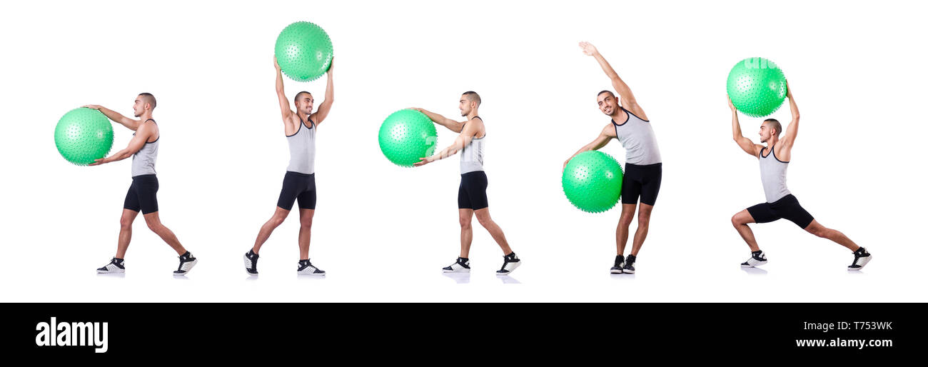 Man with swiss ball doing exercises on white Stock Photo - Alamy
