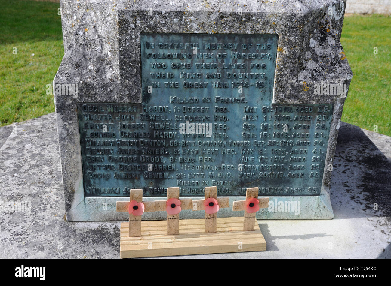 War Memorial, Waresley, Cambridgeshire, stands in the churchyard