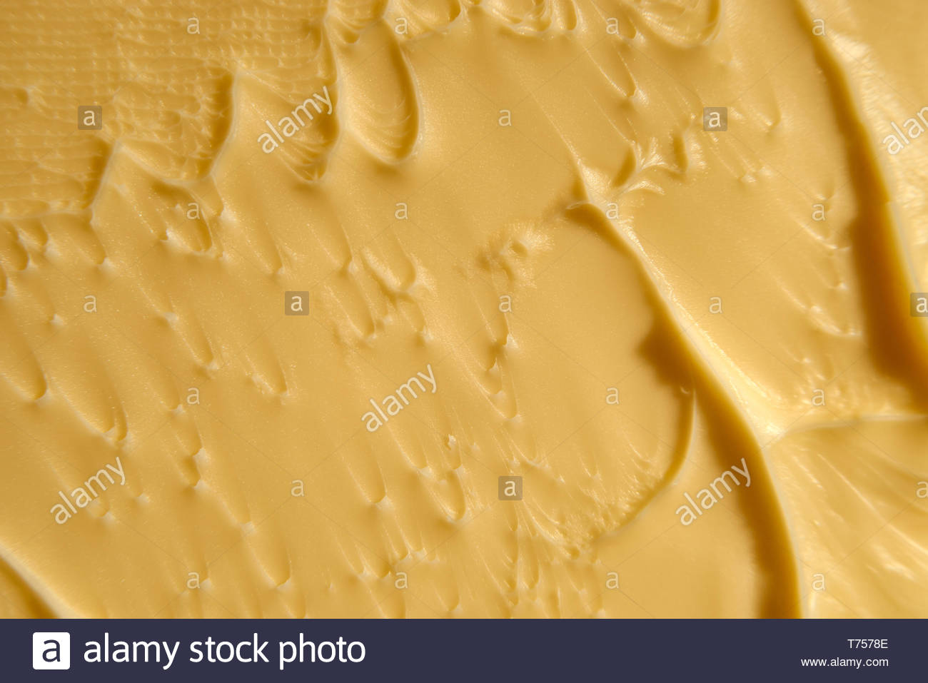 Download A Macro Image Of The Textured Surface Of A Block Of Yellow Butter Wavy Contoured And Warm With Patterned Marks Left During The Packaging Process Stock Photo Alamy Yellowimages Mockups