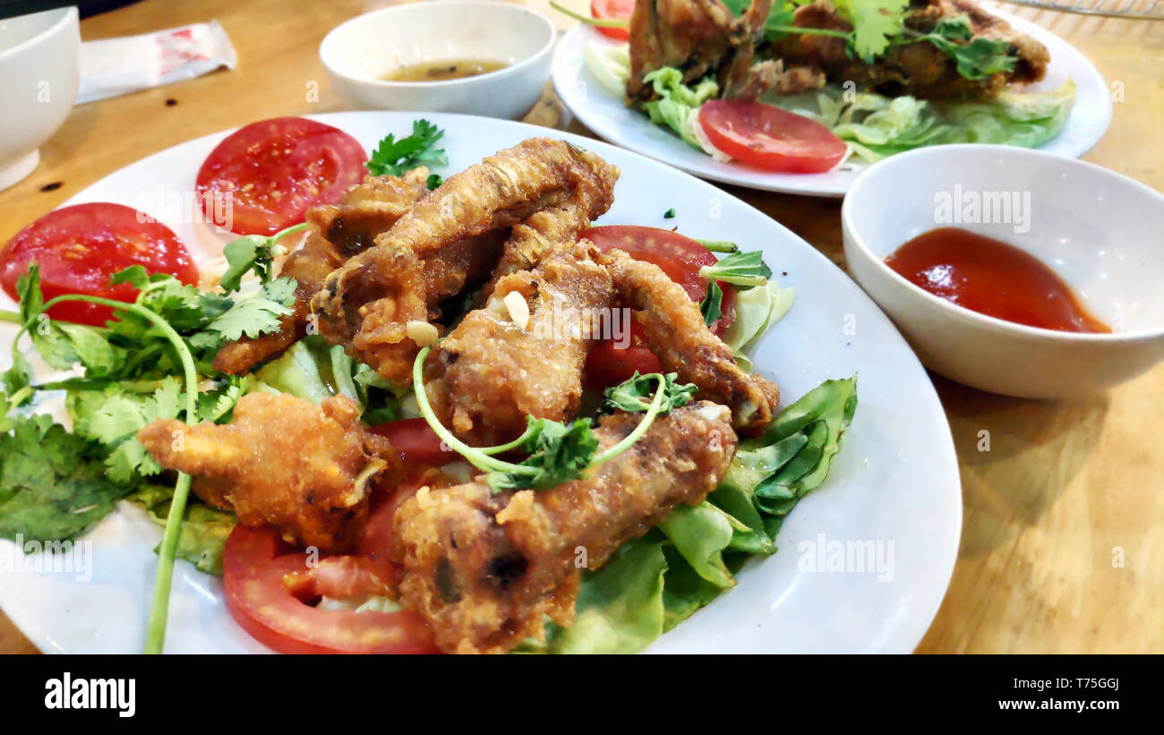 Delicious tasty crispy chicken wings deep fried with spicy crumbed