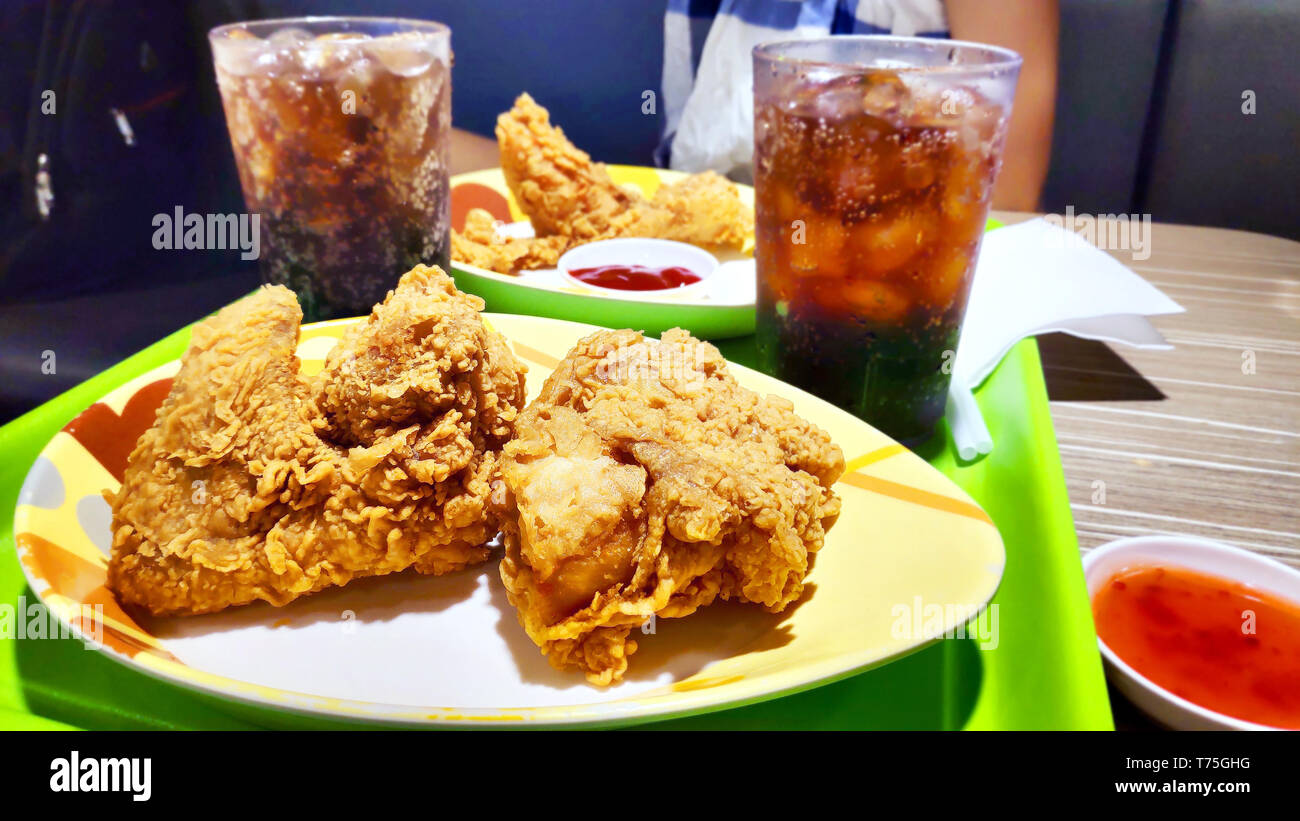 Delicious tasty crispy chicken wings deep fried with spicy crumbed