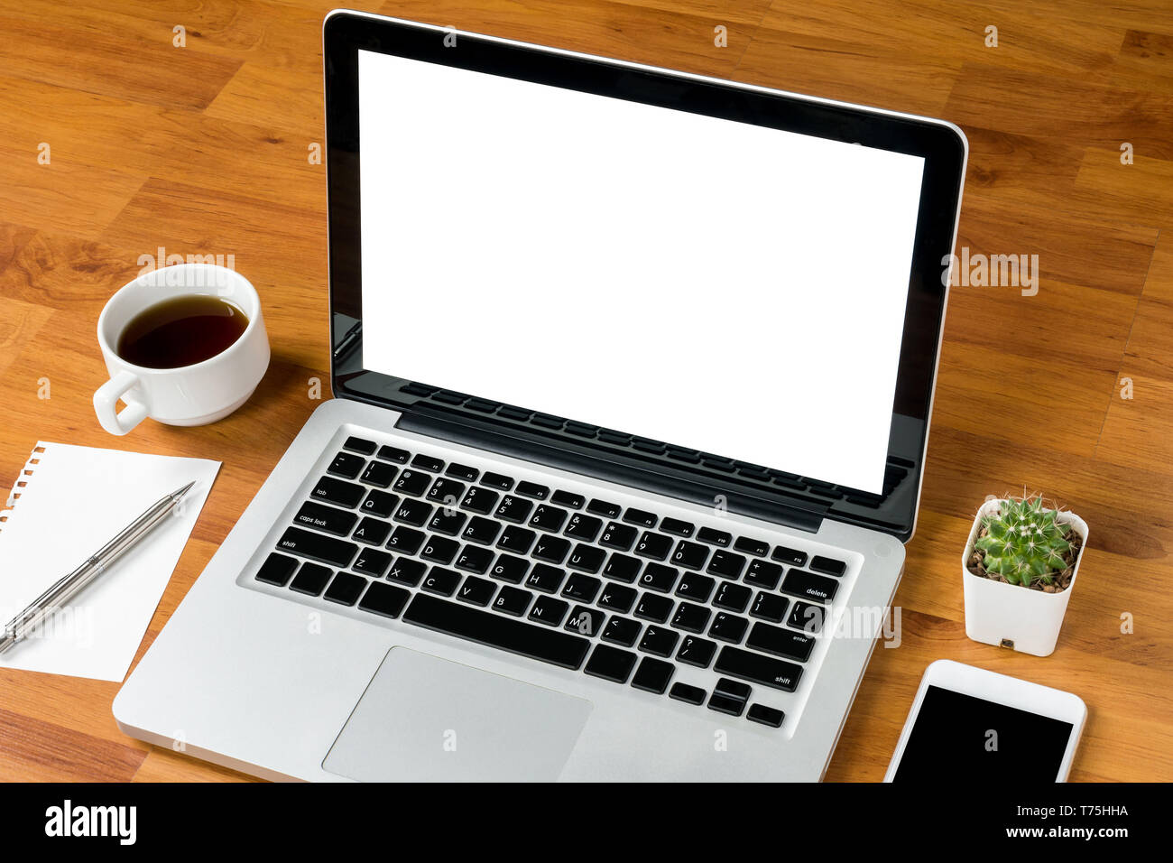 Laptop with white blank screen on the wood office table Stock Photo - Alamy