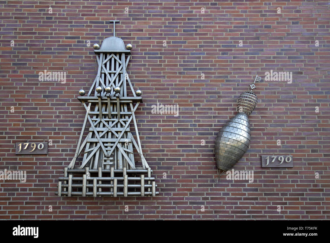 sculptures of Bremer Bake and Schluesseltonne of 1790 at the wall of the television tower, Bremerhaven, Bremen, Germany Stock Photo