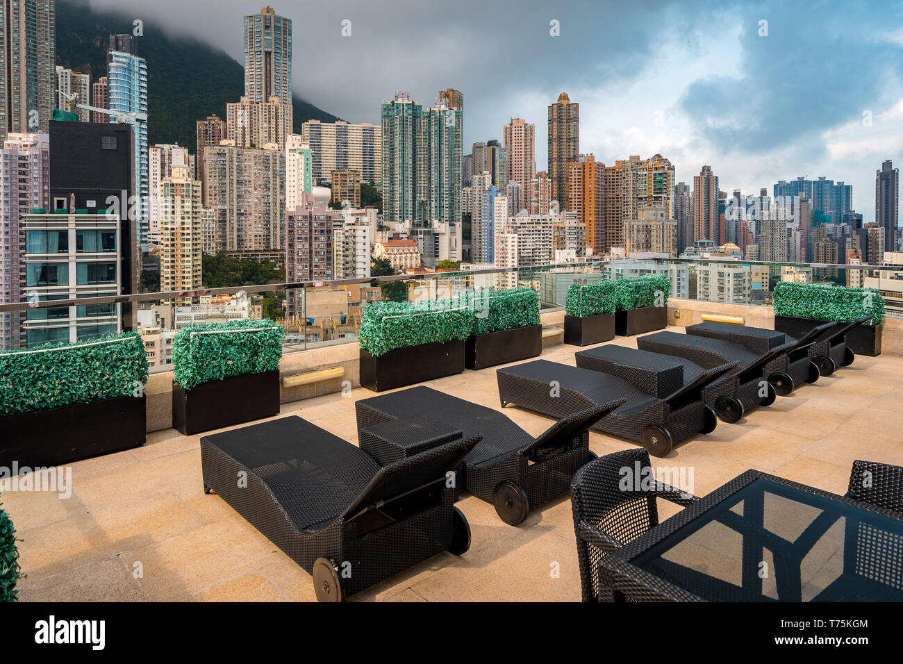 Hong Kong, China - City view from the roof top resting area Stock Photo