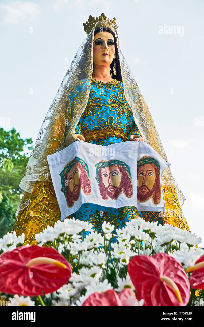 Leon, Iloilo, Philippines: Isolated view of an old decorated Statue of Mother Mary at a Good Friday procession around the church Stock Photo