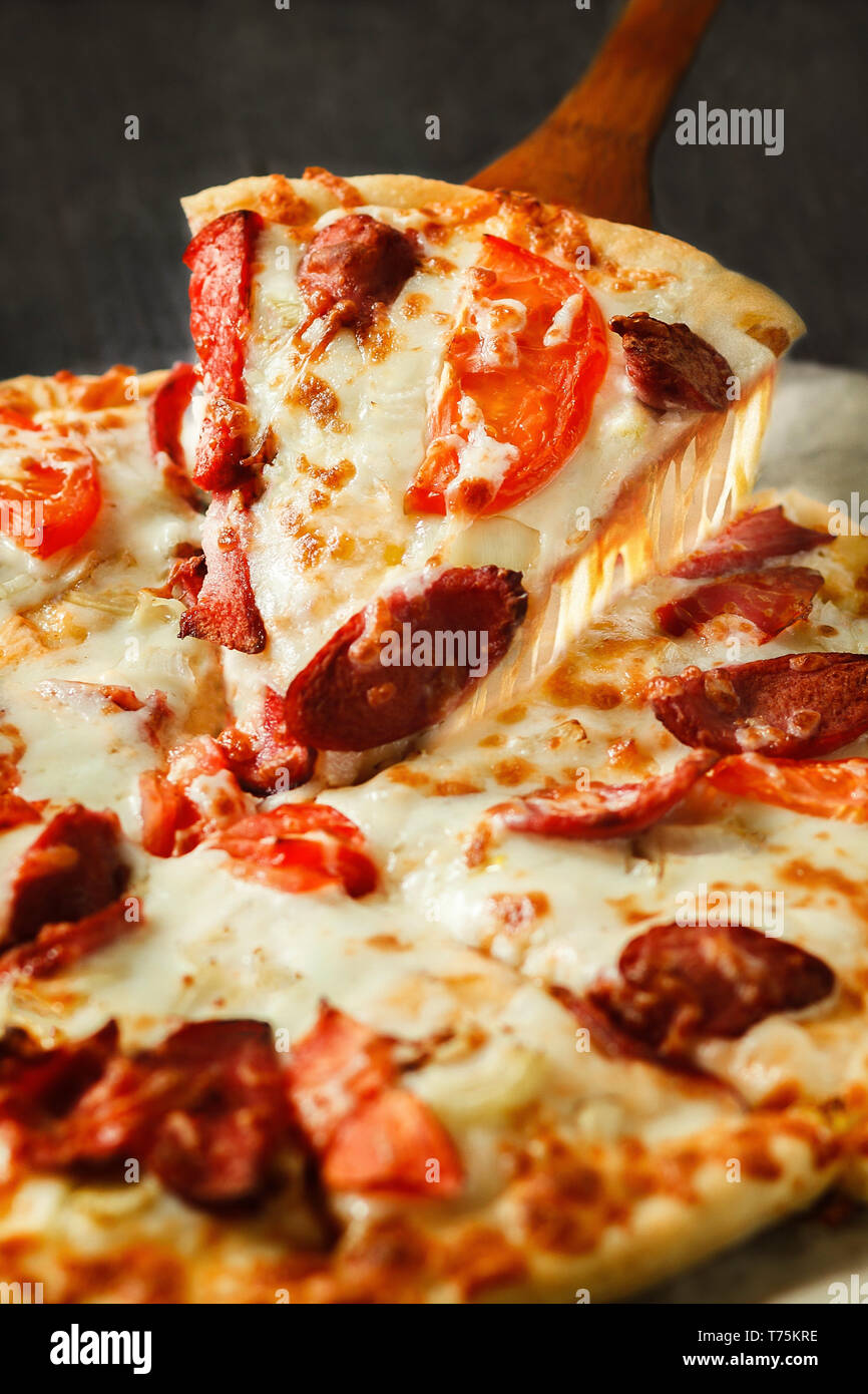 Delicious hot and fresh pizza with steam and smoke Stock Photo - Alamy