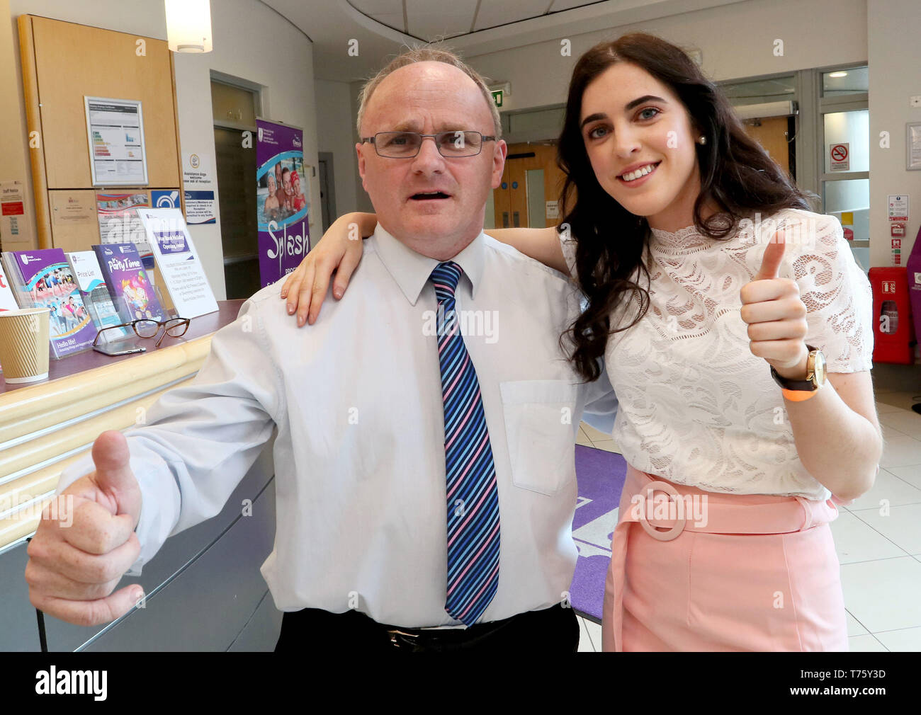 Barry McElduff celebrates with his daughter, Niamh, during the local elections count at Omagh Leisure Centre after he secured a seat on the Fermanagh and Omagh District Council. Stock Photo