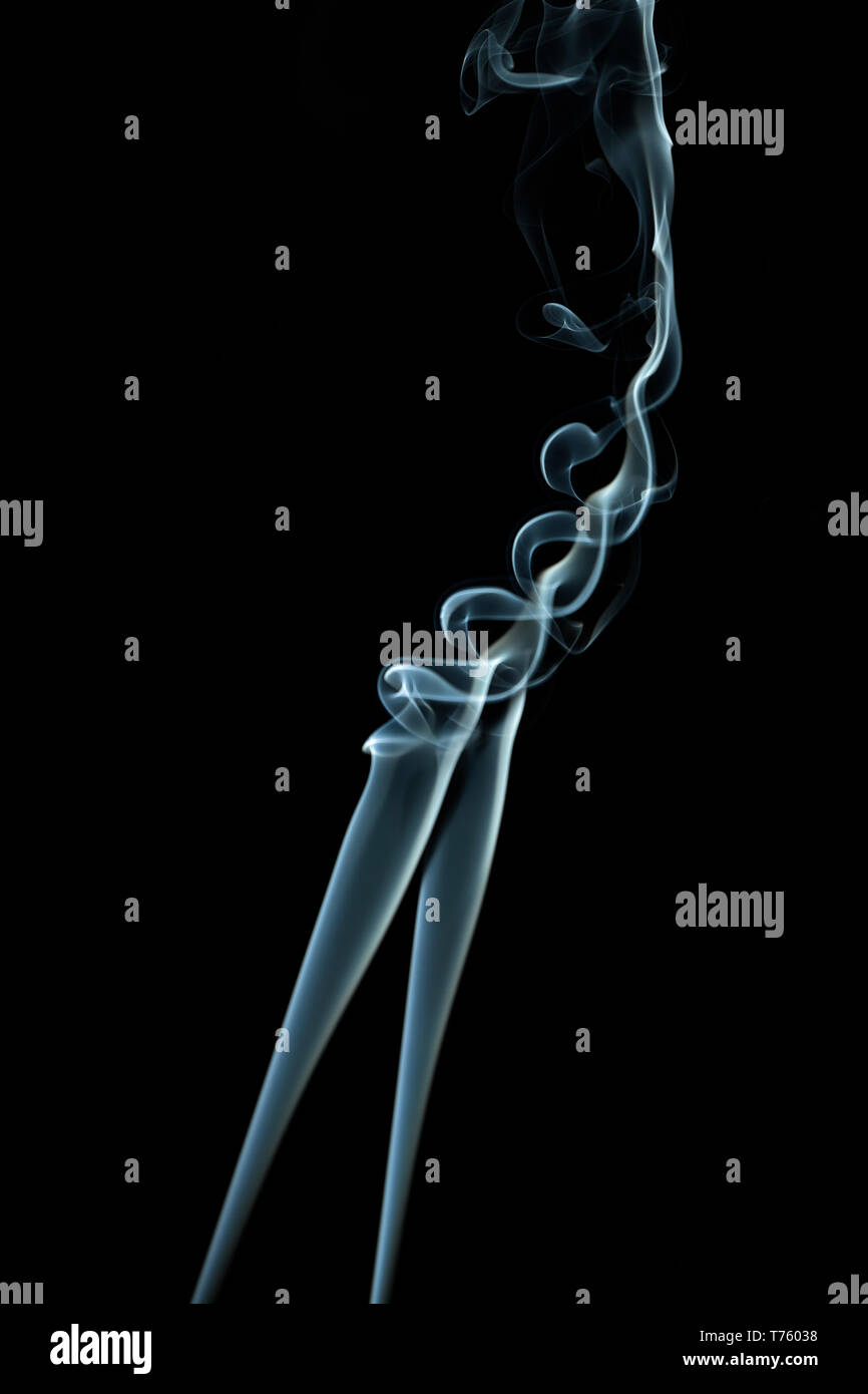 Figure abstract de smoke blue on black background Stock Photo - Alamy