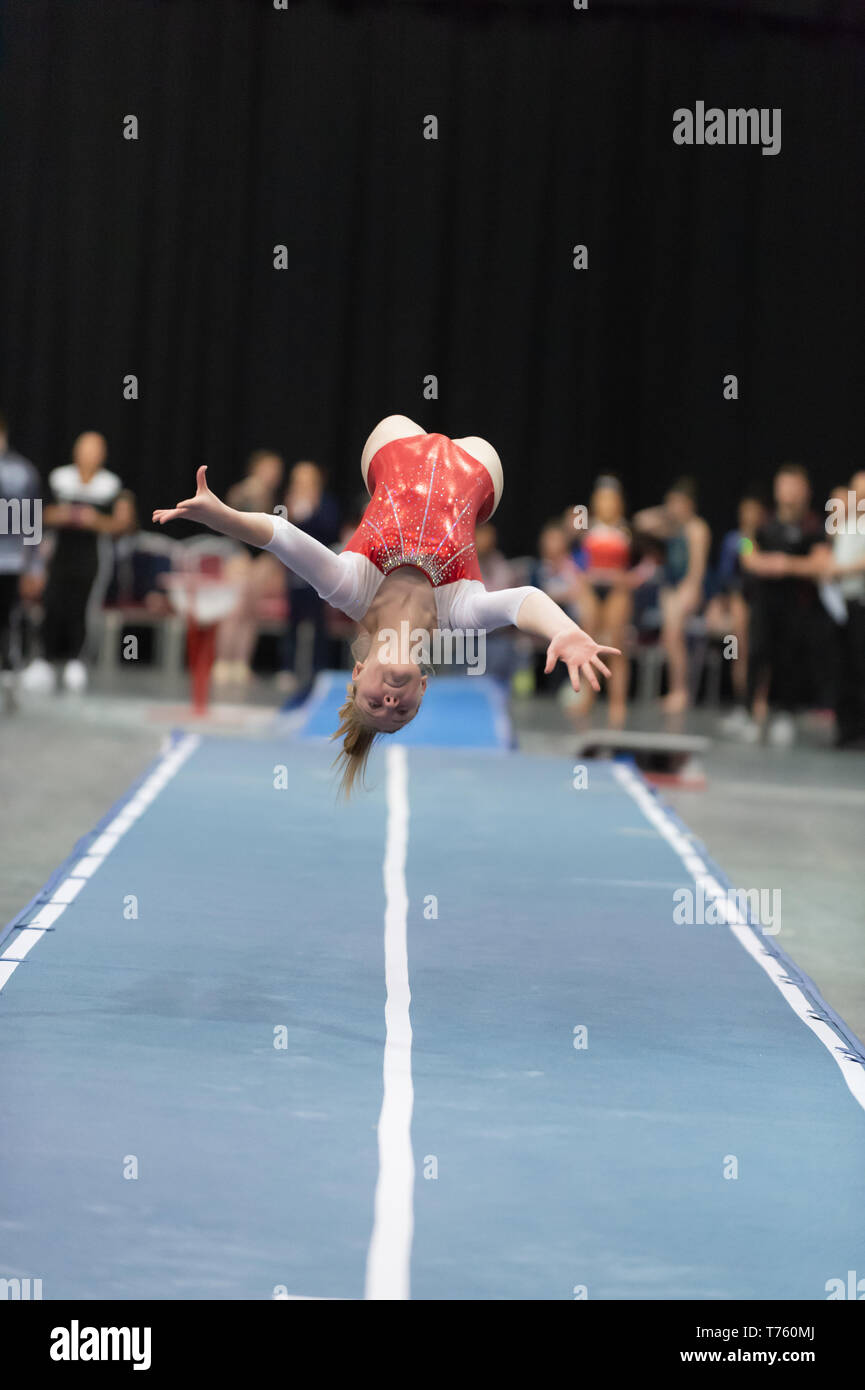 Telford, England, UK. 27 April, 2018. A female gymnast from Milton Keynes Gym in action during Spring Series 1 at the Telford International Centre, Telford, UK. Stock Photo