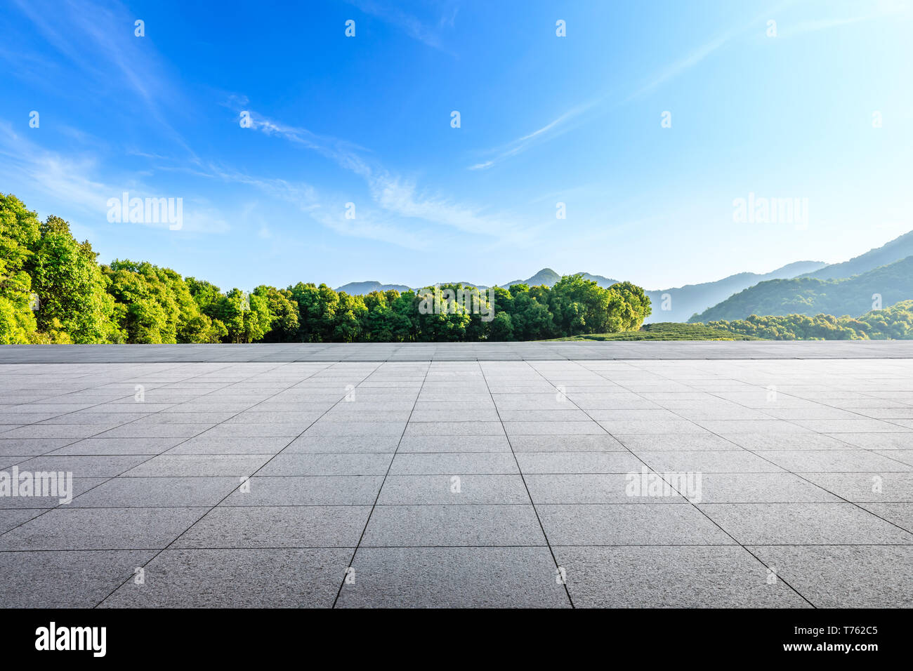 Empty square floor and green mountain natural landscape Stock Photo