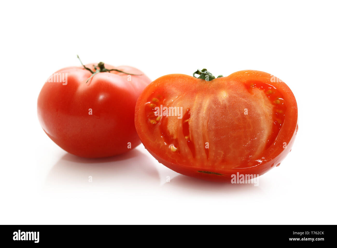 red tomatoes on a white background Stock Photo