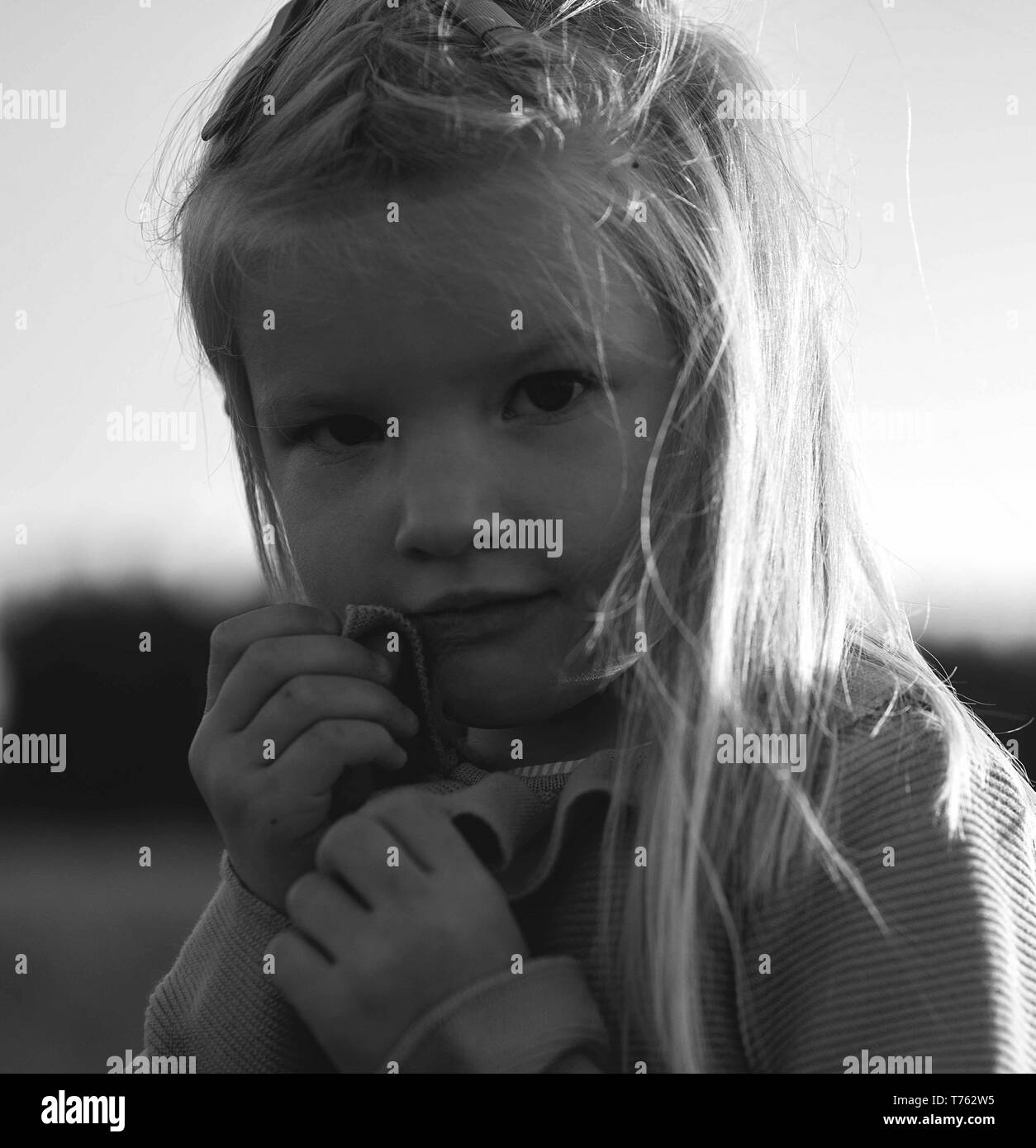 Cute little girl outdoor portrait Stock Photo - Alamy