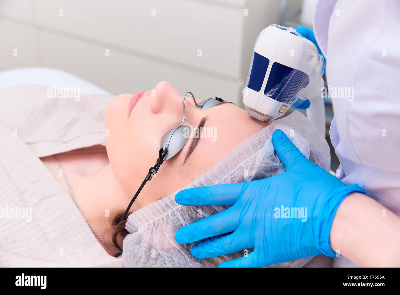 Laser procedure in the clinic of laser cosmetology Stock Photo Alamy