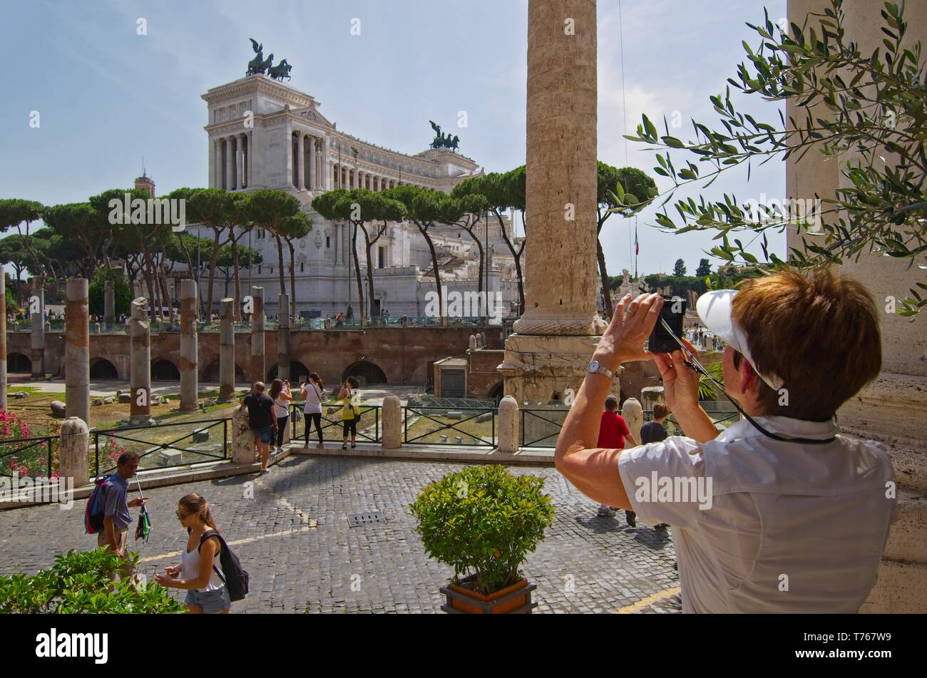 Looking across the Trajan Forum to the Vittorio Emanuele II Monument (Altare della Patria or Altar of the Fatherland) in Rome on a bright, sunny day Stock Photo