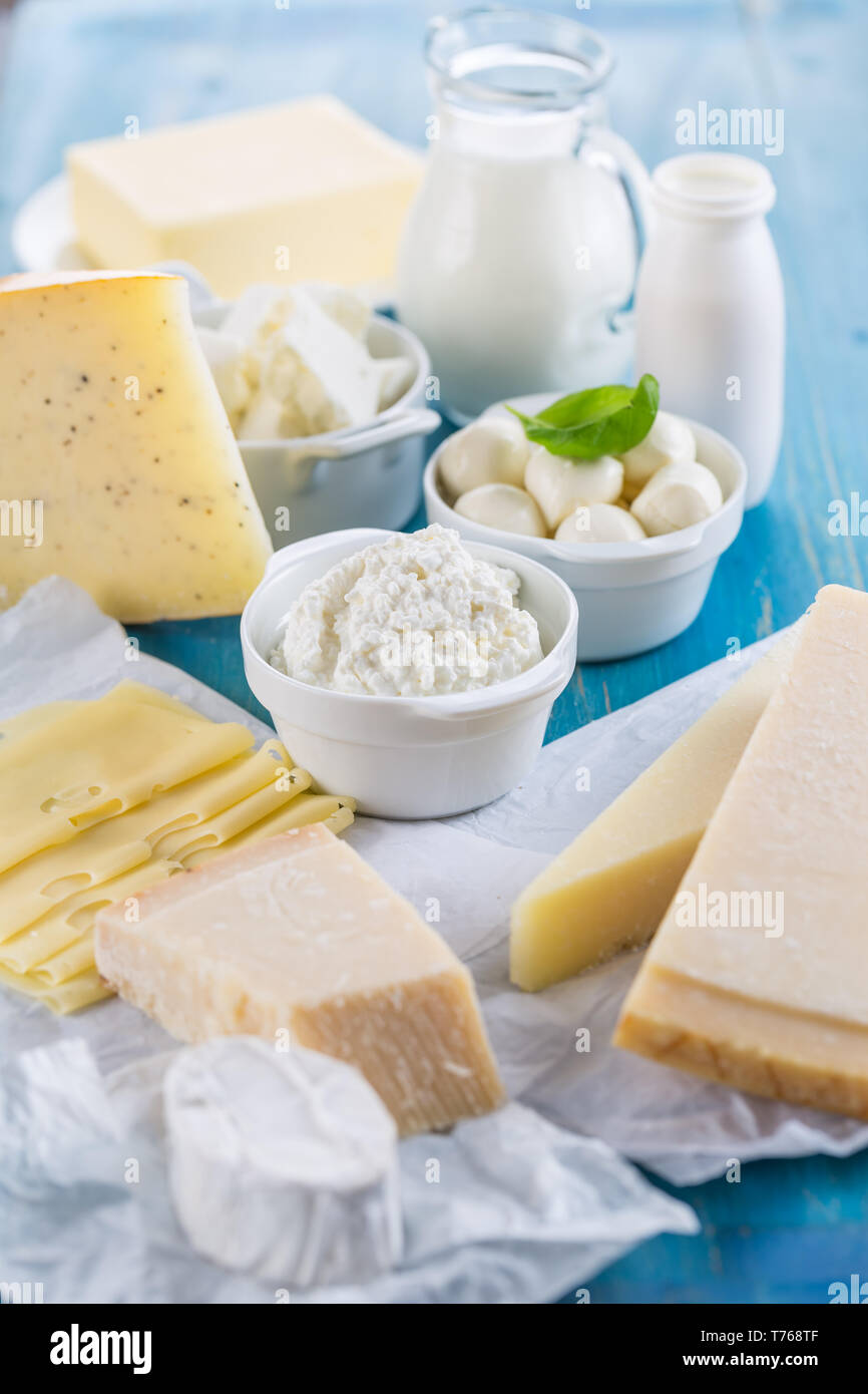 Different types of dairy products on wooden background Stock Photo