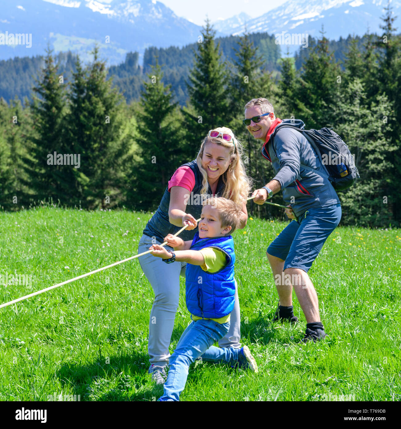 Family on nature trail in springtime near Ofterschwang in Upper Allgäu Stock Photo
