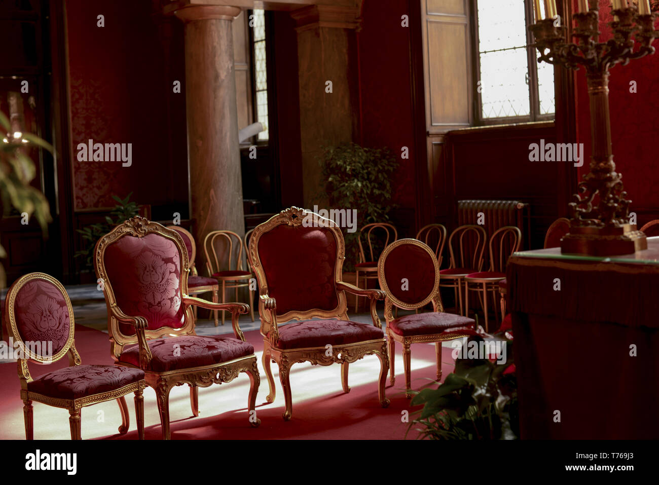 ceremonial red room of the Campidoglio in Rome for the civil marriage ceremonies Stock Photo