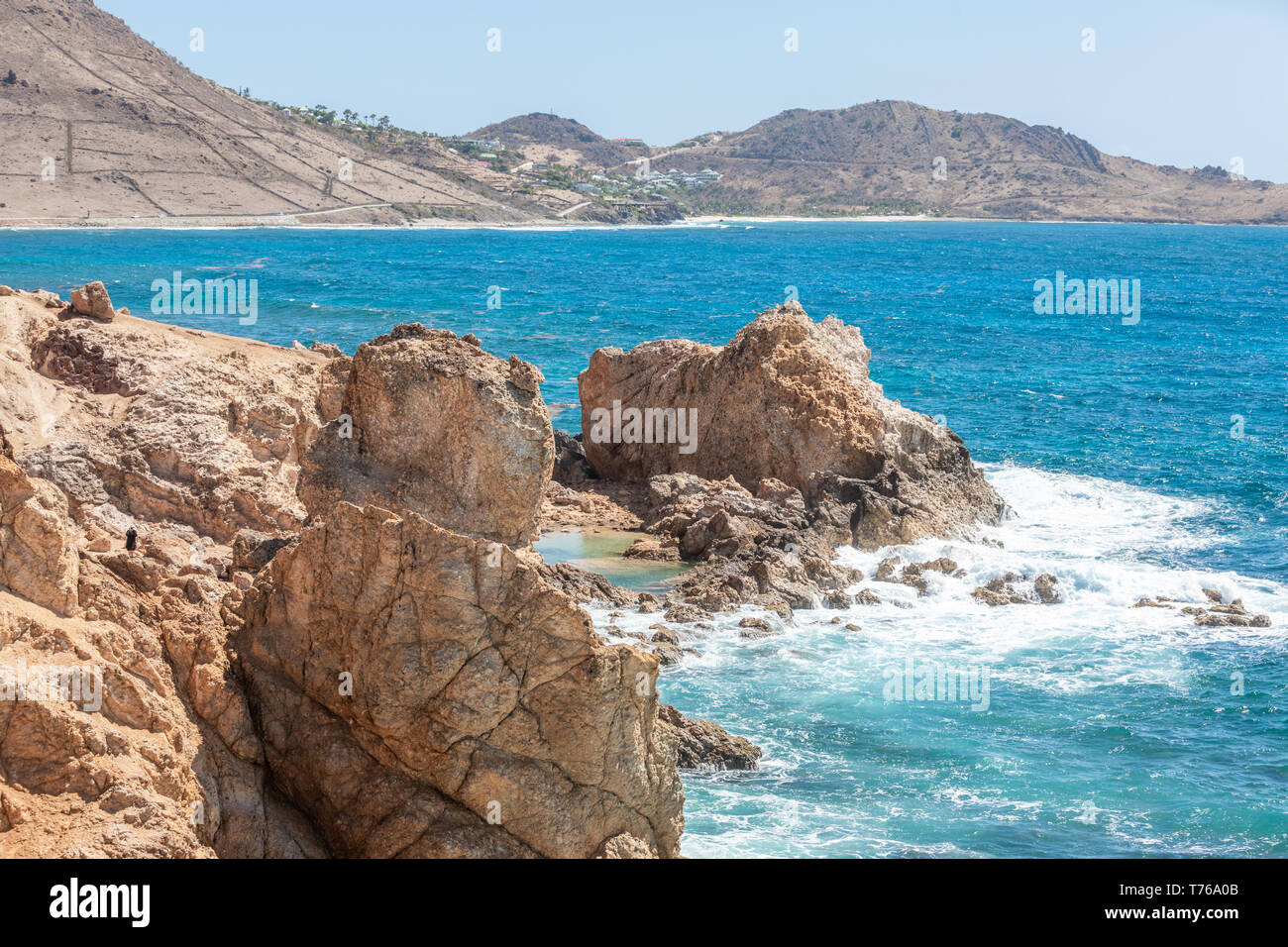 The rocky shore line of Grand Fond, St Barts Stock Photo