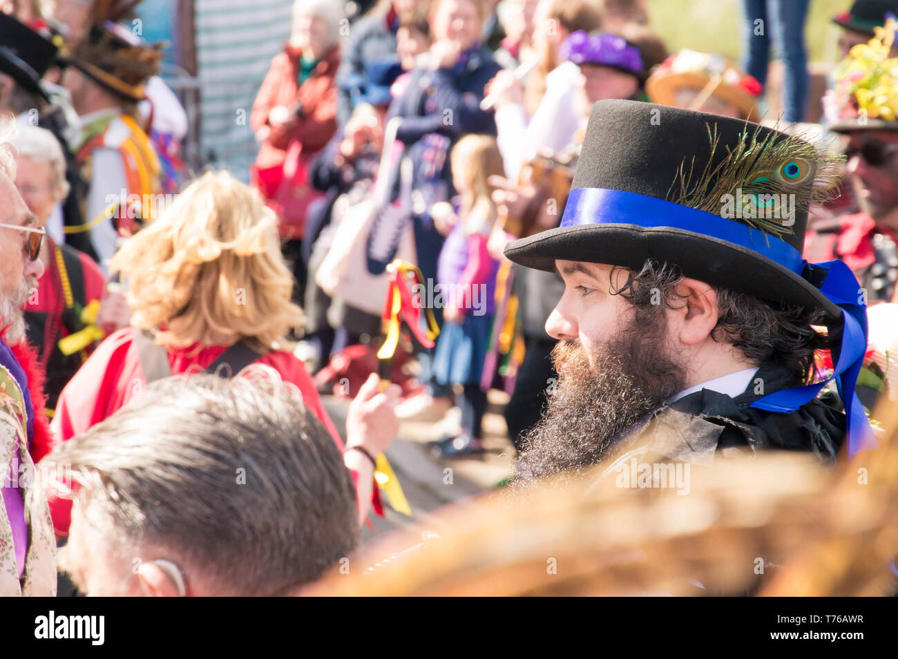 Upton Upon Severn, UK. 4th May 2019, A Morris dancer with peacock