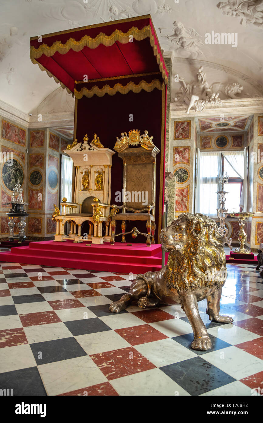 Hillerod, Denmark - June, 2016: Throne Hall of Frederiksborg Castle. The royal throne in the interior of the Frederiksborg Castle. Stock Photo