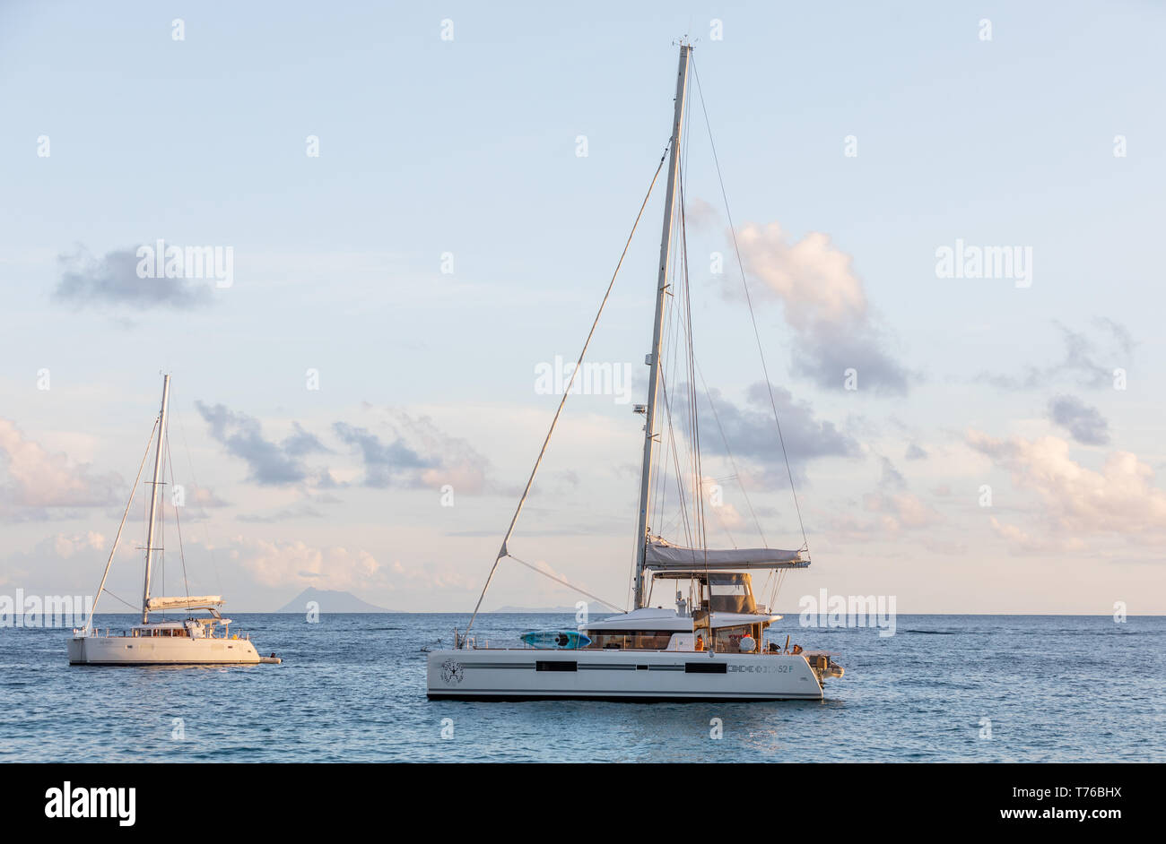 Two sail boats just of Shell Beach in St Barts Stock Photo