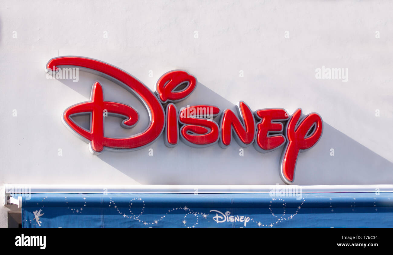 Disney logo sign on facade front of store. Close up image. Copenhagen, Denmark - May 4, 2019. Stock Photo
