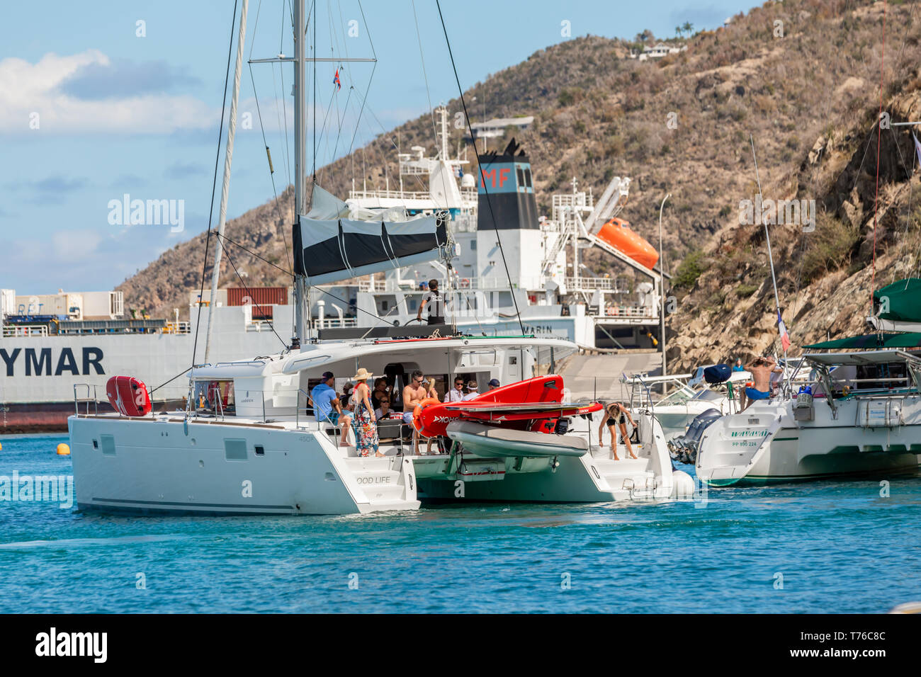sail boat with people on board, Gustavia, St Barts Stock Photo