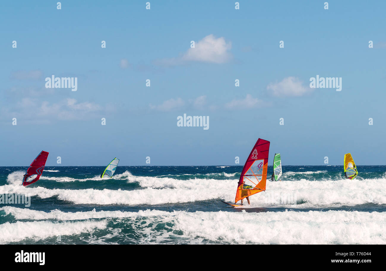 6th Nov 2017. Tenerife, Spain. Windsurfers practise and catching waves on a holiday island of Tenerife. Stock Photo