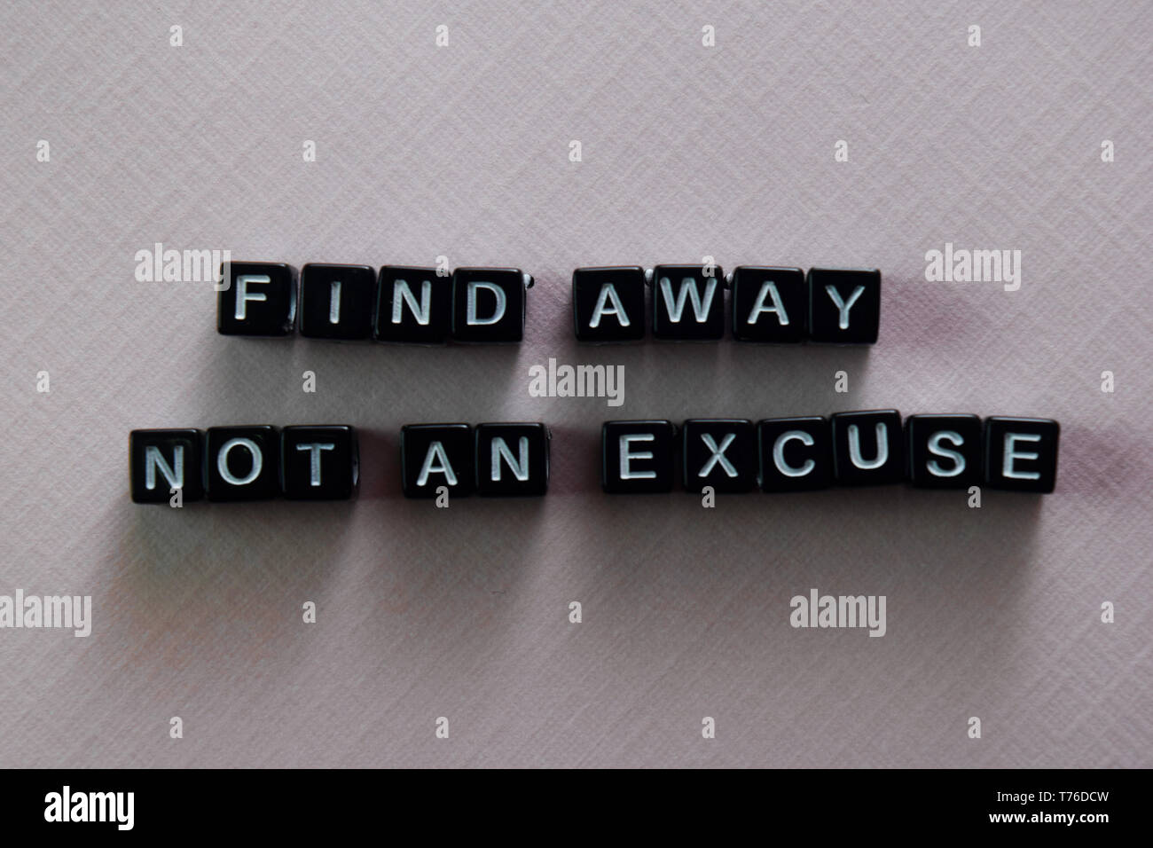 Find away not an excuse on wooden blocks. Motivation and inspiration concept Stock Photo