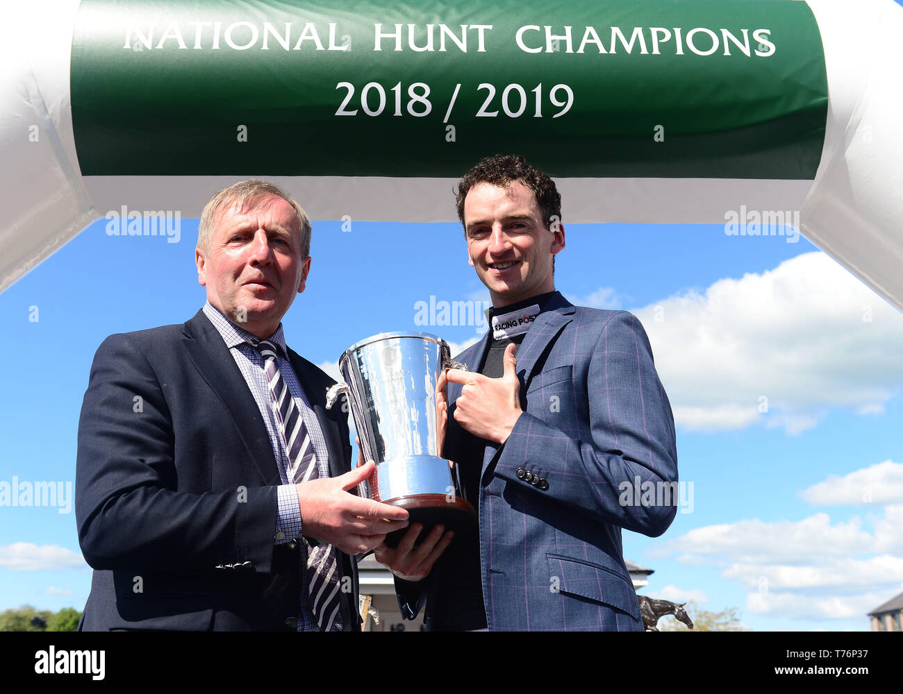 Presentation 2018-2019 National Hunt Awards Minister Michael Creed presents Patrick Mullins during day five of the Punchestown Festival at Punchestown Racecourse, County Kildare, Ireland. Stock Photo