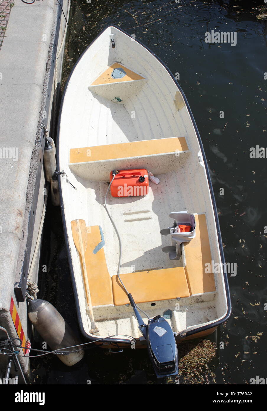 Boat tied to a pier Stock Photo - Alamy