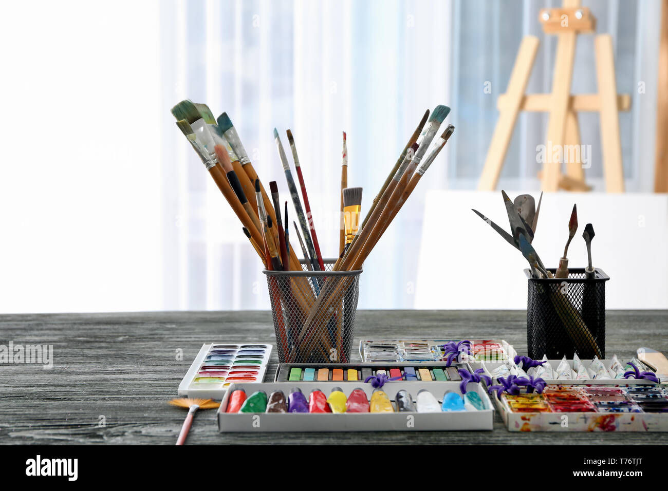 Tools and paints of professional artist on table Stock Photo - Alamy