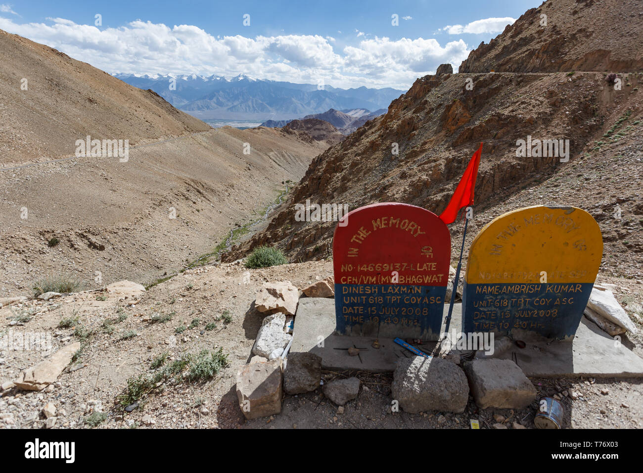 Roadside memorial grave markers on dangerous mountain pass in Kashmir India Stock Photo