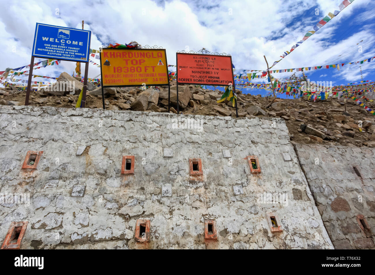 Welocme signs at the border wall  between Jammu and Kashmir on the highest motorable road in the world 18,380 feet high. Stock Photo