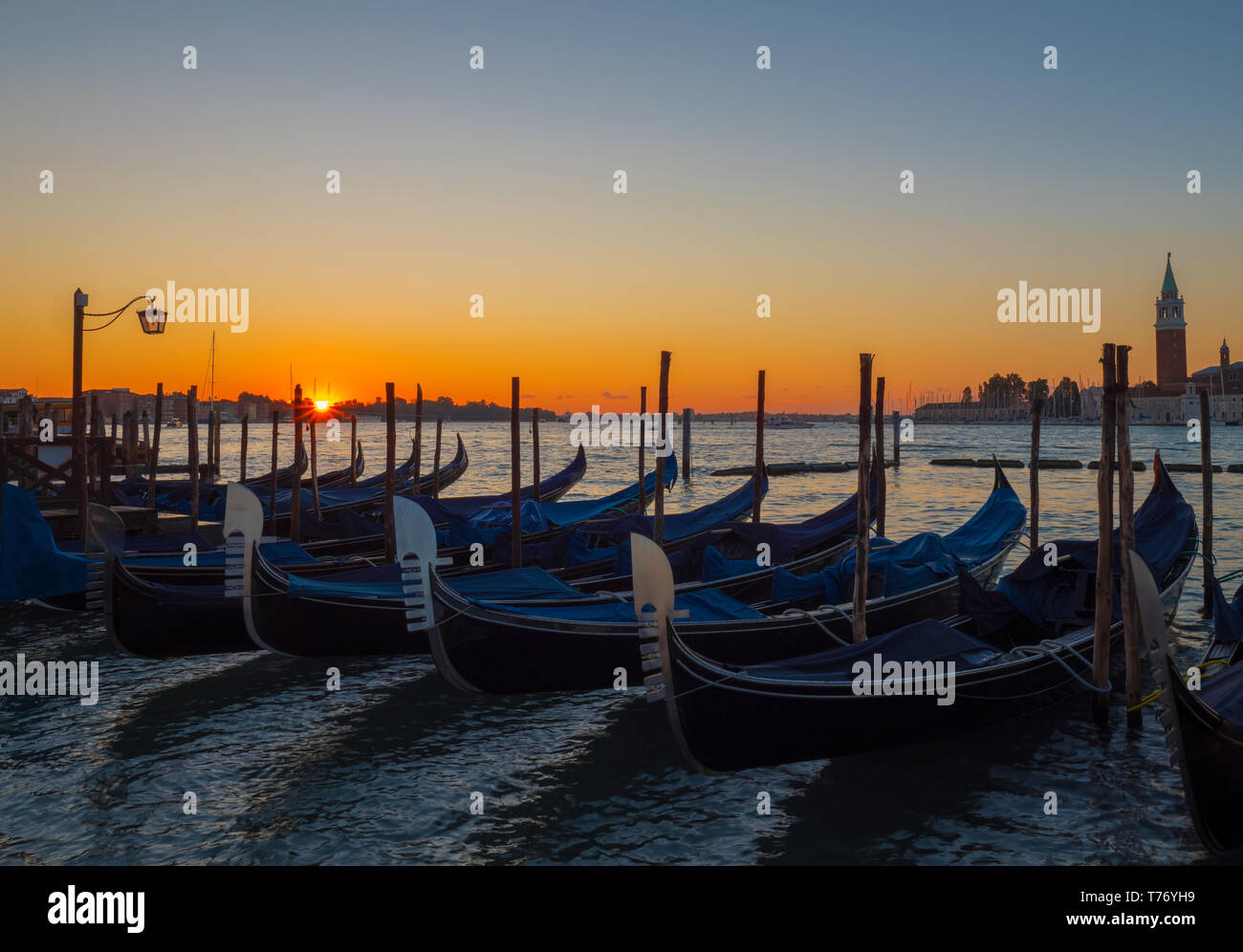 Gondolas sunrise in venice hi-res stock photography and images - Alamy