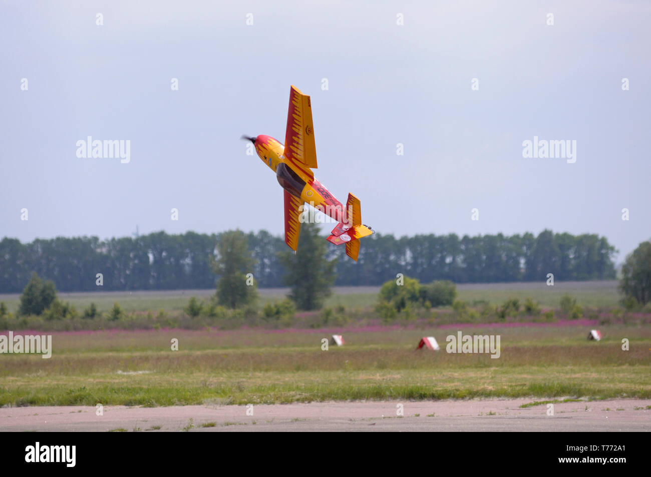 Acrobatic maneuvers. Radio controlled airplane flying in the sky. 7th