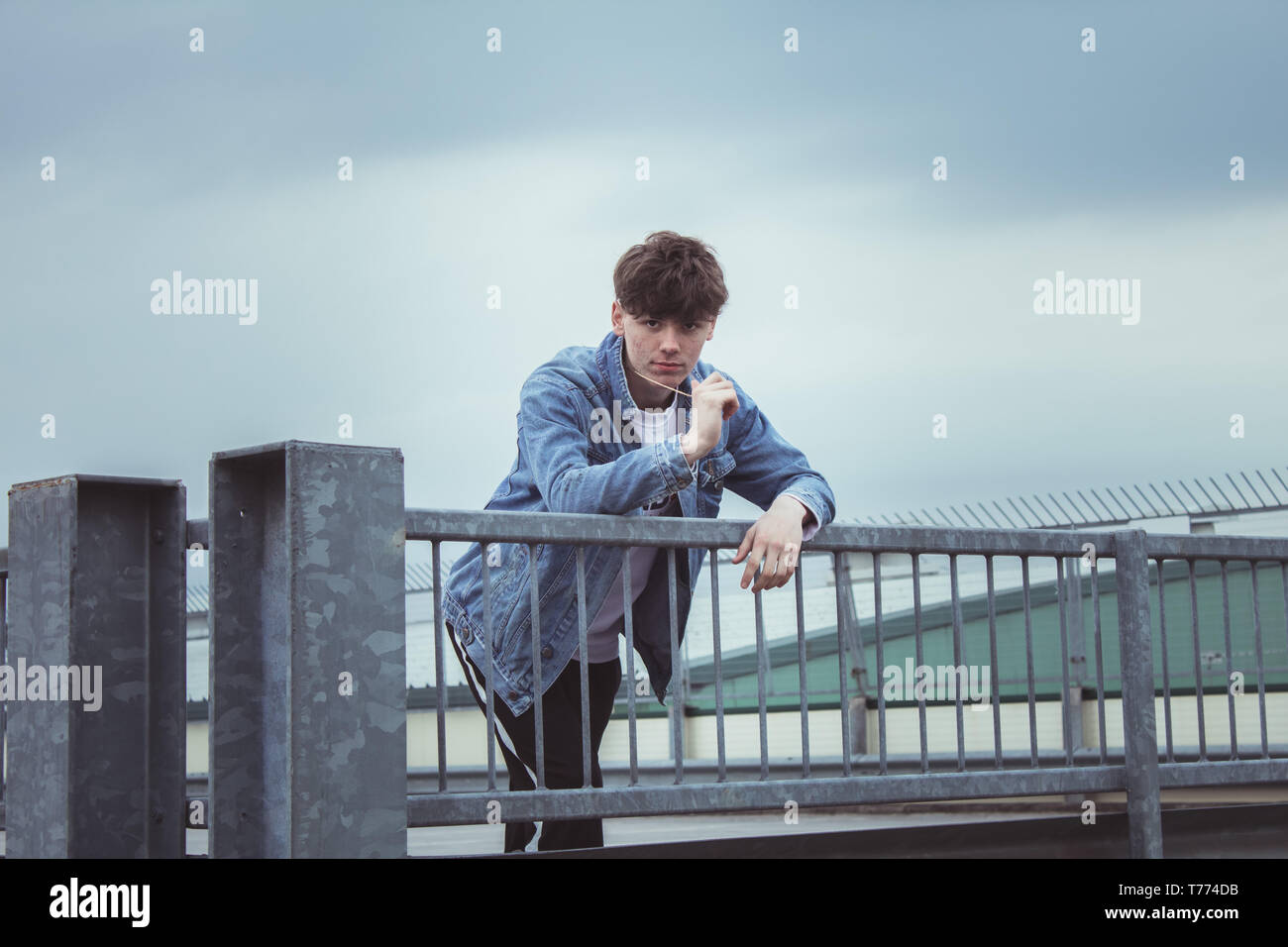 Young stylist model with denim jacket Stock Photo