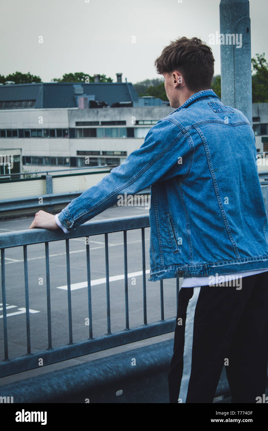 Young stylist model with denim jacket Stock Photo