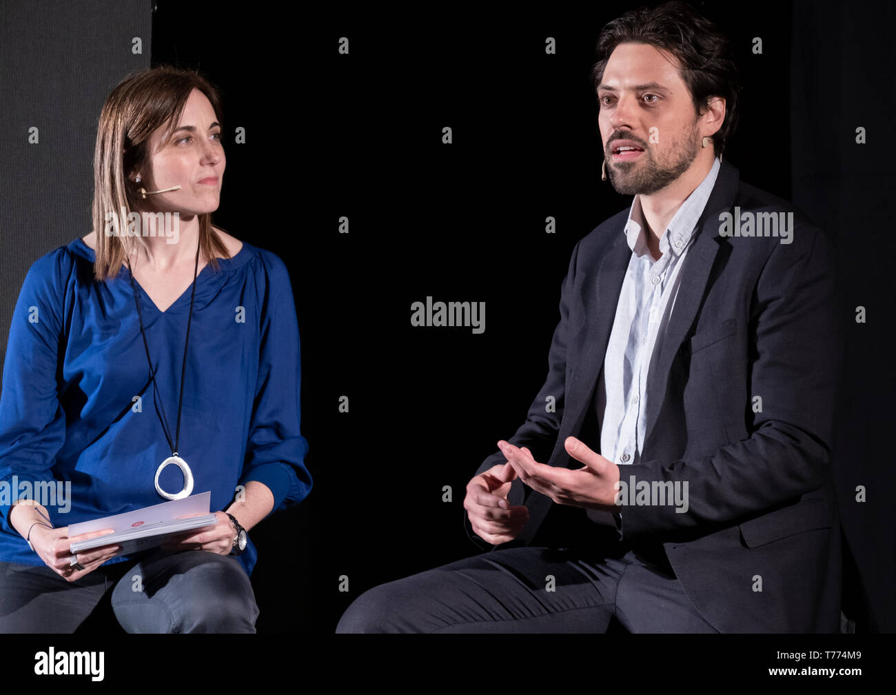 The journalist and board member of Òmnium, Claudia Pujol seen accompanying Jordi Cuixart's defence lawyer Olivier Peter on stage during the presentation of The evidence forbidden by the Supreme Court. Marcel Mauri de los Rios, spokesman for the pro-independence association Omnium Cultural,  and Olivier Peter, defence lawyer for Jordi Cuixart, have participated at the event The prohibited evidence of the Supreme Court, uncovered, organized by Omnium Cultural consisted in the viewing  videos of the police repression during the election day of October 1. The judge of the Spanish Supreme Court, Ma Stock Photo