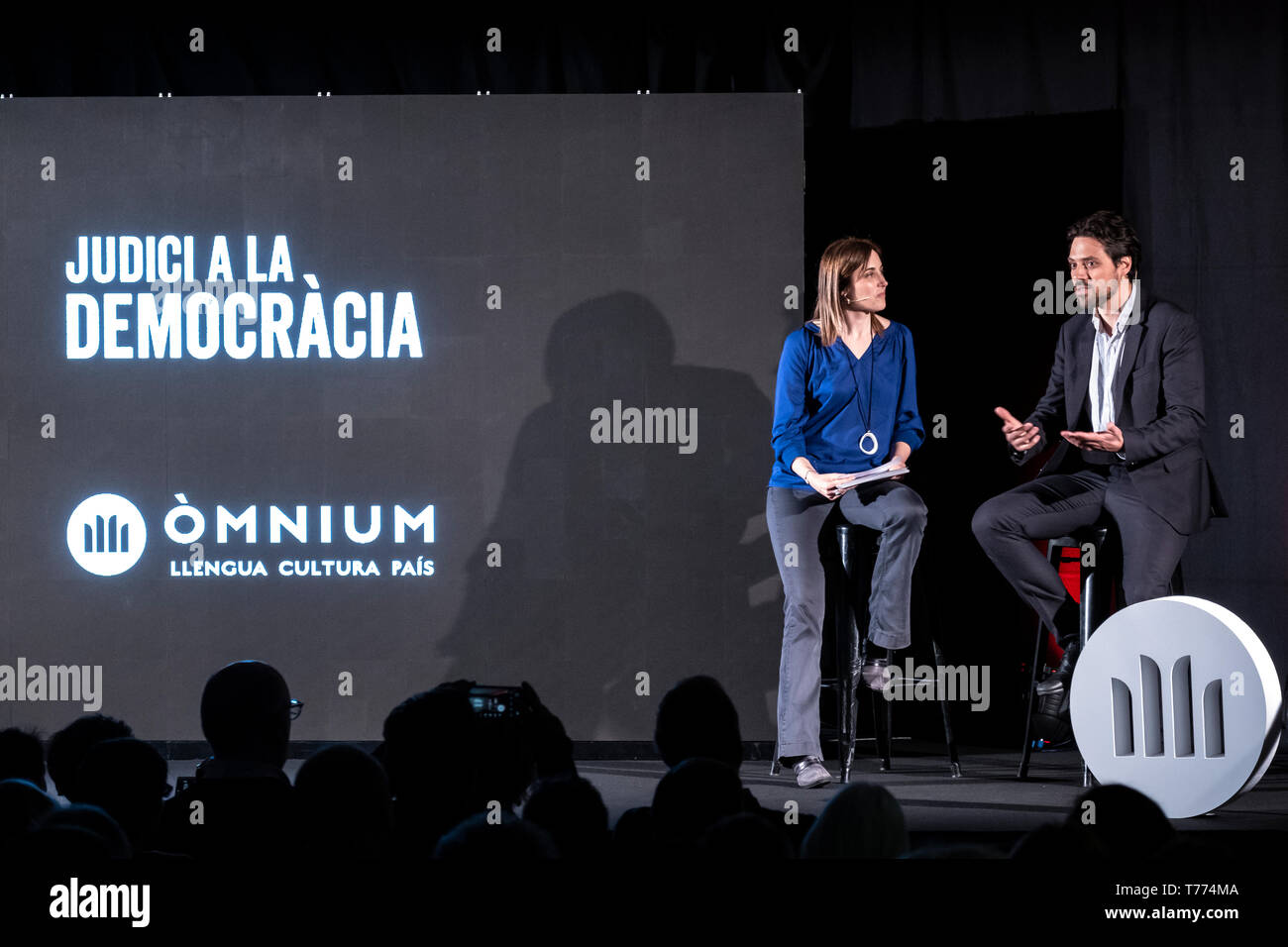 The journalist and board member of Òmnium, Claudia Pujol seen accompanying Jordi Cuixart's defence lawyer Olivier Peter on stage during the presentation of The evidence forbidden by the Supreme Court. Marcel Mauri de los Rios, spokesman for the pro-independence association Omnium Cultural,  and Olivier Peter, defence lawyer for Jordi Cuixart, have participated at the event The prohibited evidence of the Supreme Court, uncovered, organized by Omnium Cultural consisted in the viewing  videos of the police repression during the election day of October 1. The judge of the Spanish Supreme Court, Ma Stock Photo