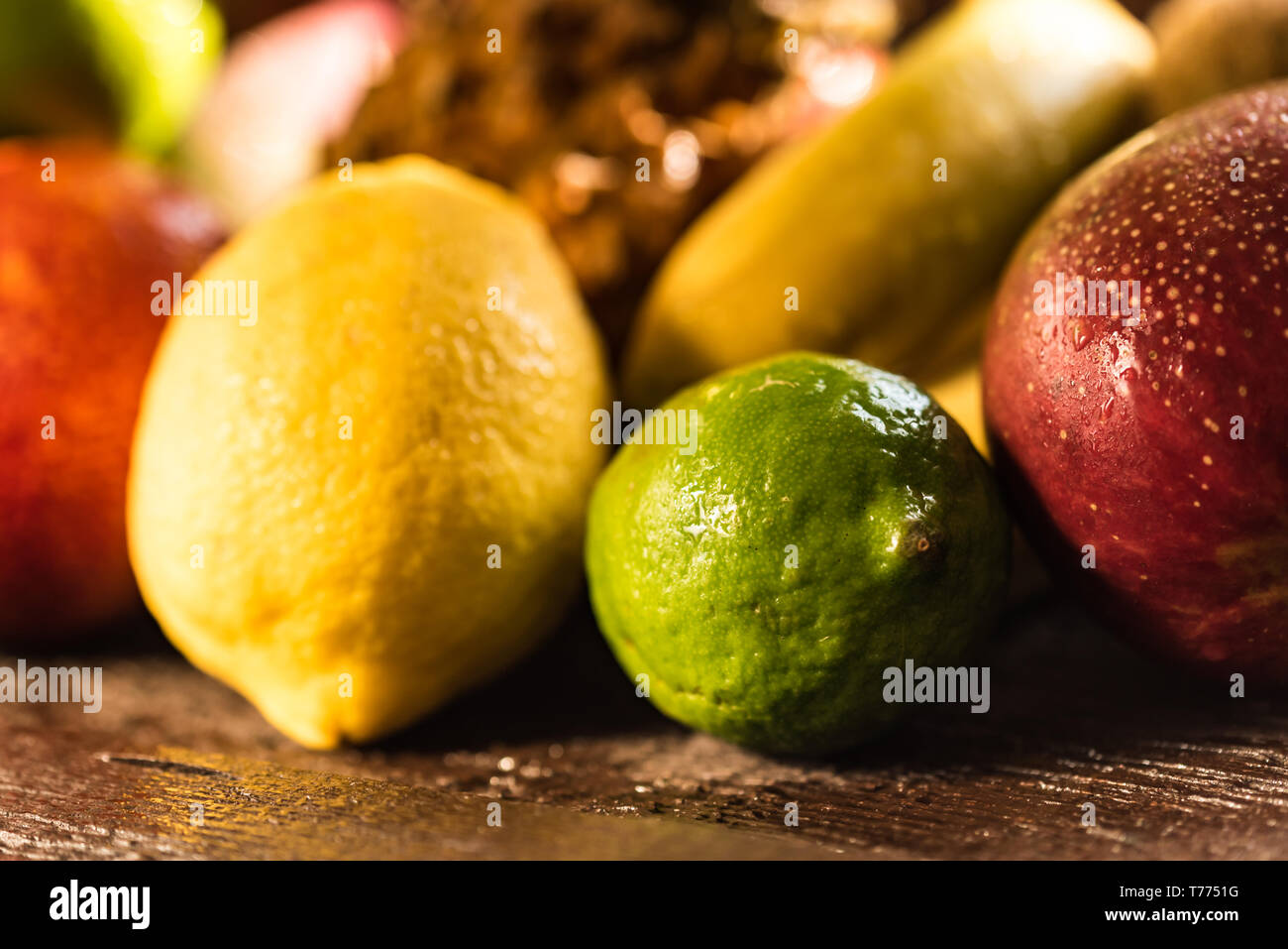 Studio shot of various exotic fruit on wood Stock Photo