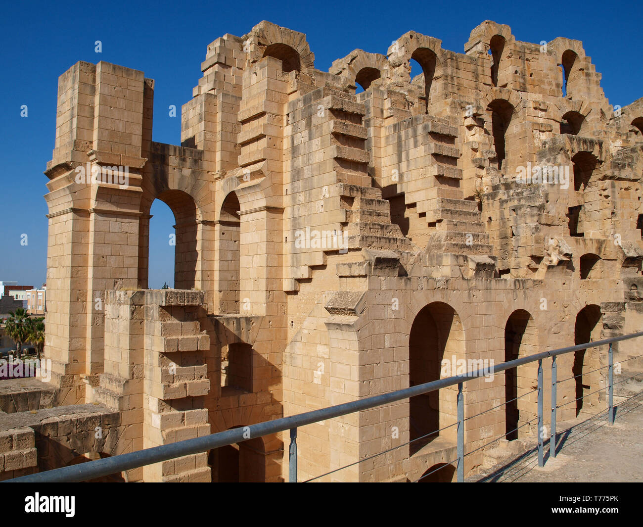 Fragment of the ancient Roman amphitheater in El Jem in Tunisia, horizontal photo Stock Photo