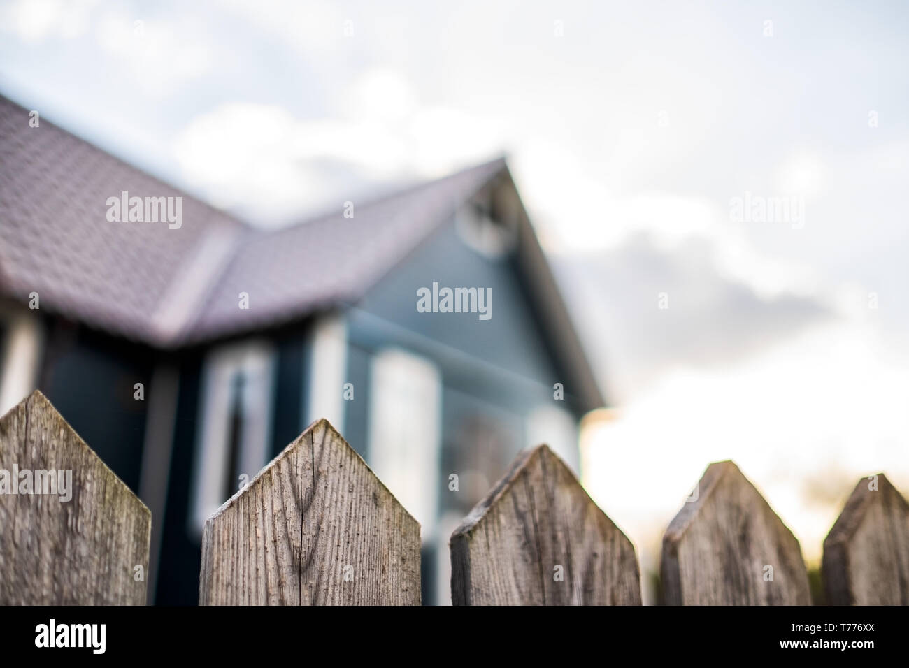 Traditional village house with wooden fence at russian rural ...